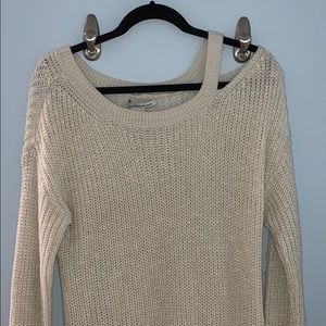 sweater with shoulder cutout